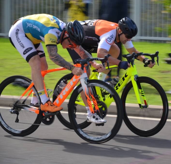 Wheel to wheel: It was a close finish for second and third position in Division 1 between Scott James and Scott Delfs. The decision went to Delfs (Illawarra CC).