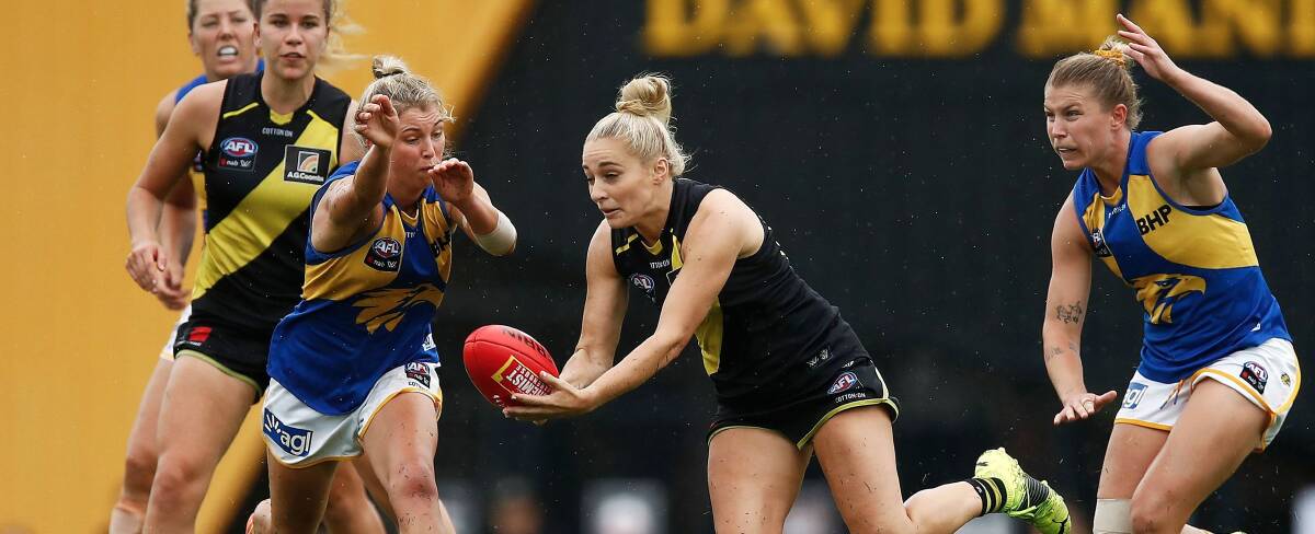 West Coast's Maddy Collier puts pressure on Richmond's Sarah Hosking. Photo: Eagles Media