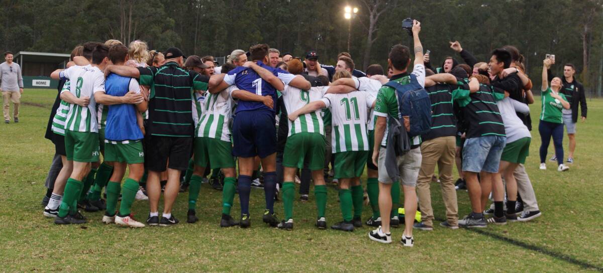 Huskisson-Vincentia sing their team song after last year's grand final win against Bomaderry. Photo: RACH HALL