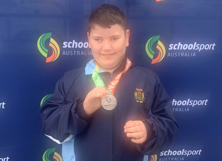 BIG FUTURE: North Nowra Public School's Kynan Miller claimed silver in the junior boys (8-10 years) multi-class shot put event at the School Sport Australia Track and Field Championships.