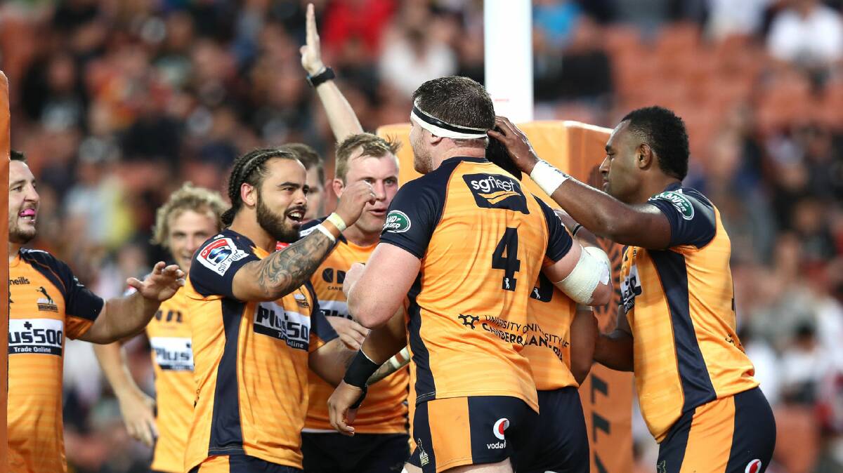Will Miller and his ACT teammates celebrate a try on Saturday. Photo: BRUMBIES MEDIA