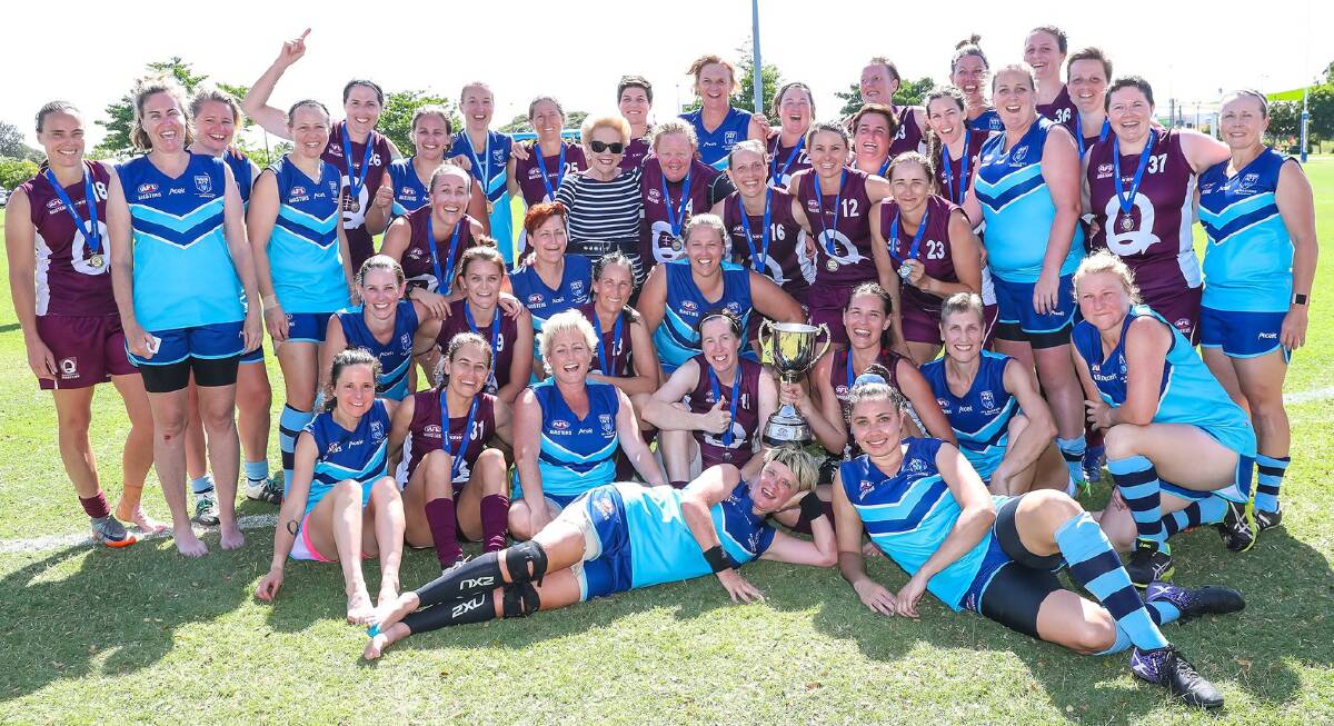 Kate Bramley (back row, seventh from left) with the NSW and Queensland teams after their finals match. Photo: SUPPLIED