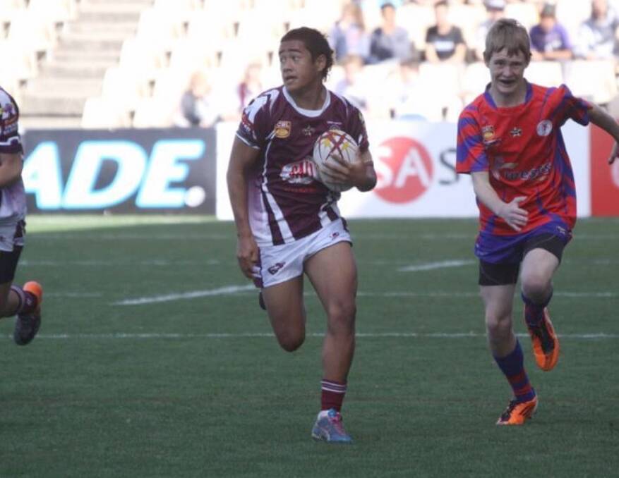 Donte Efaraimo makes a break for the Eagles during his junior days. Photo: Supplied