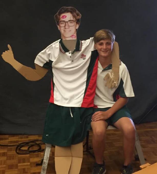 Hayden Batson (Jack's brother) and a cut-out of Jack on Bomaderry High School photo day. Photo: Supplied