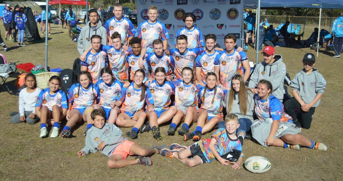 PRIDE IN THEIR JERSEY: The 2018 boys and girls YUIN Snakes squads at the Nations of Origin tournament last week. Photo: TONI CONLON