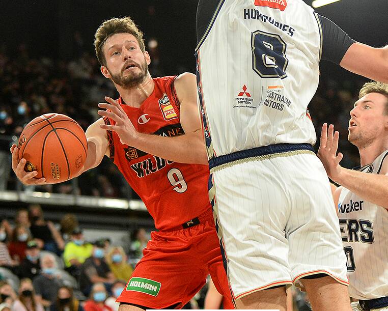 Sanctuary Point's Kyle Zunic attacks the basket during Perth's loss to Adelaide on Tuesday. Photo: NBL Media