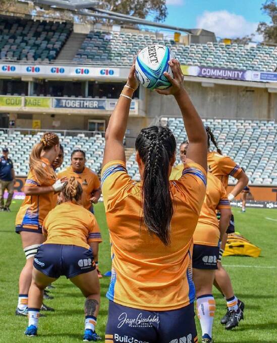 Grace Sullivan practices a line-out during an ACT warm-up. Photo: Brumbies Rugby