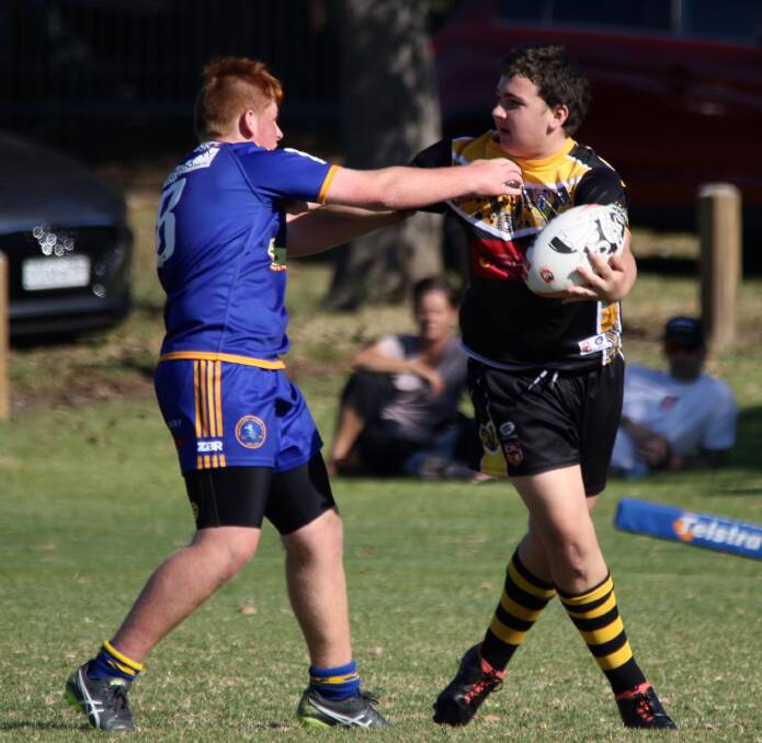Under 14s Zac Cruickshank asserts his attacking dominance during a Group Seven Rugby League season game.