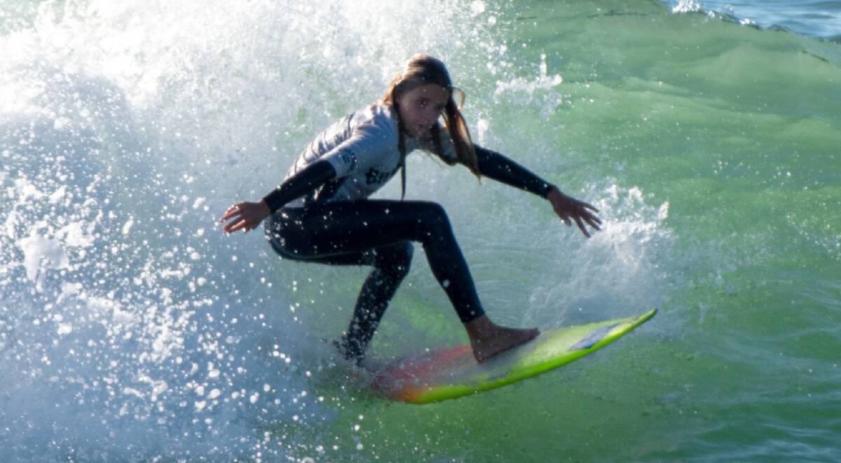 Werri Beach Boardrider Lucy Darragh surfs while at Coffs Harbour. Photo: Surfing NSW/Smith