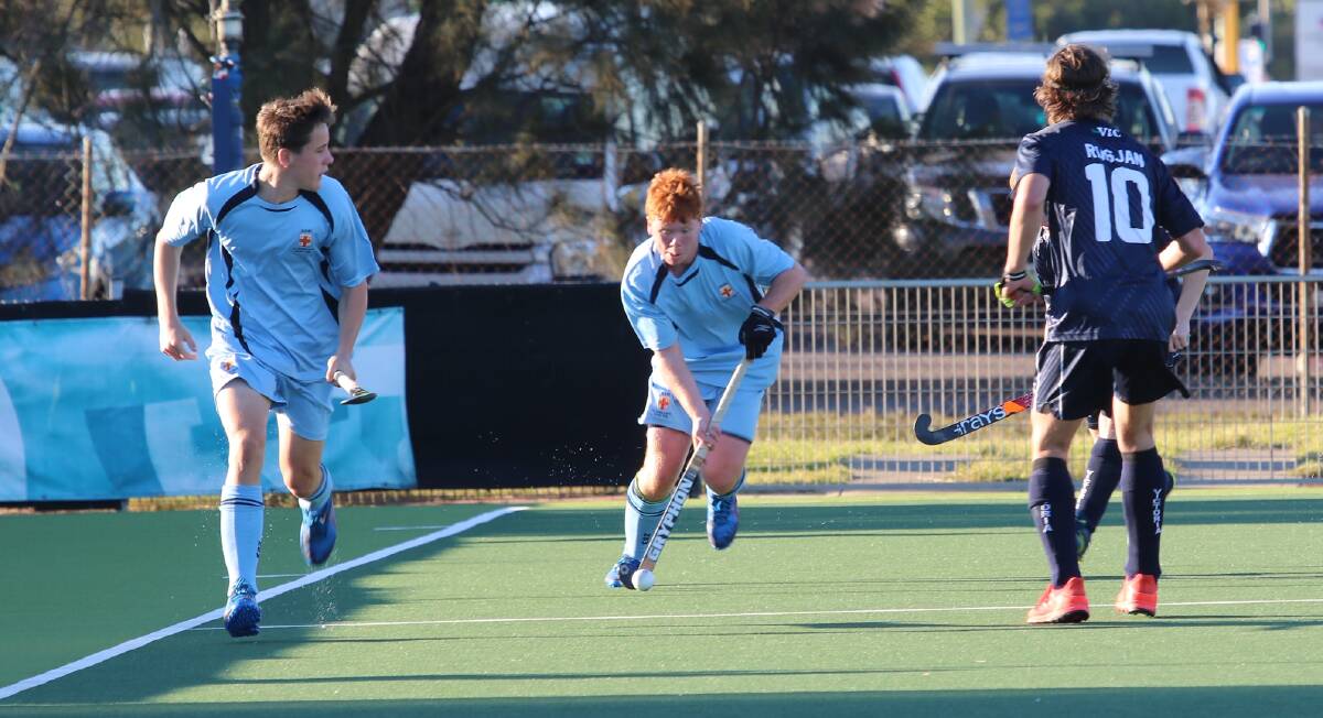 Sam Wright-Smith (middle) in action for NSW during the All Schools carnival. Photo: JOHN ALDERTON