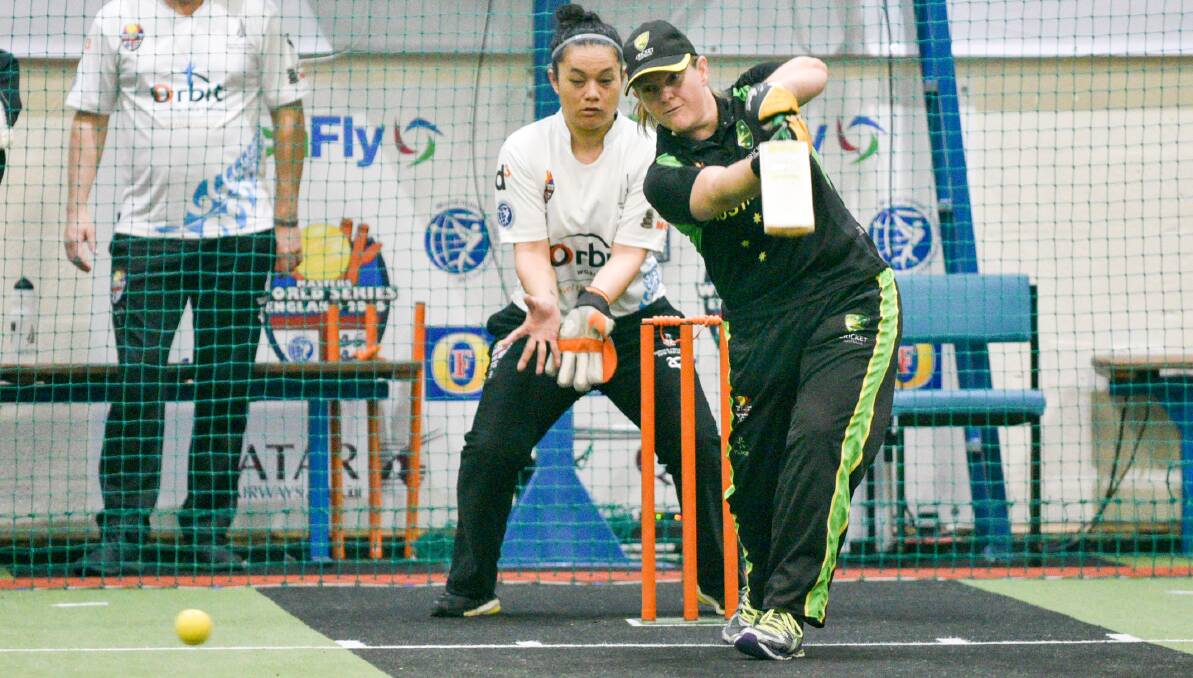 STAR: Joanne Kelly plays a shot through the offside while representing Australia at the recent Indoor Cricket Masters World Series.