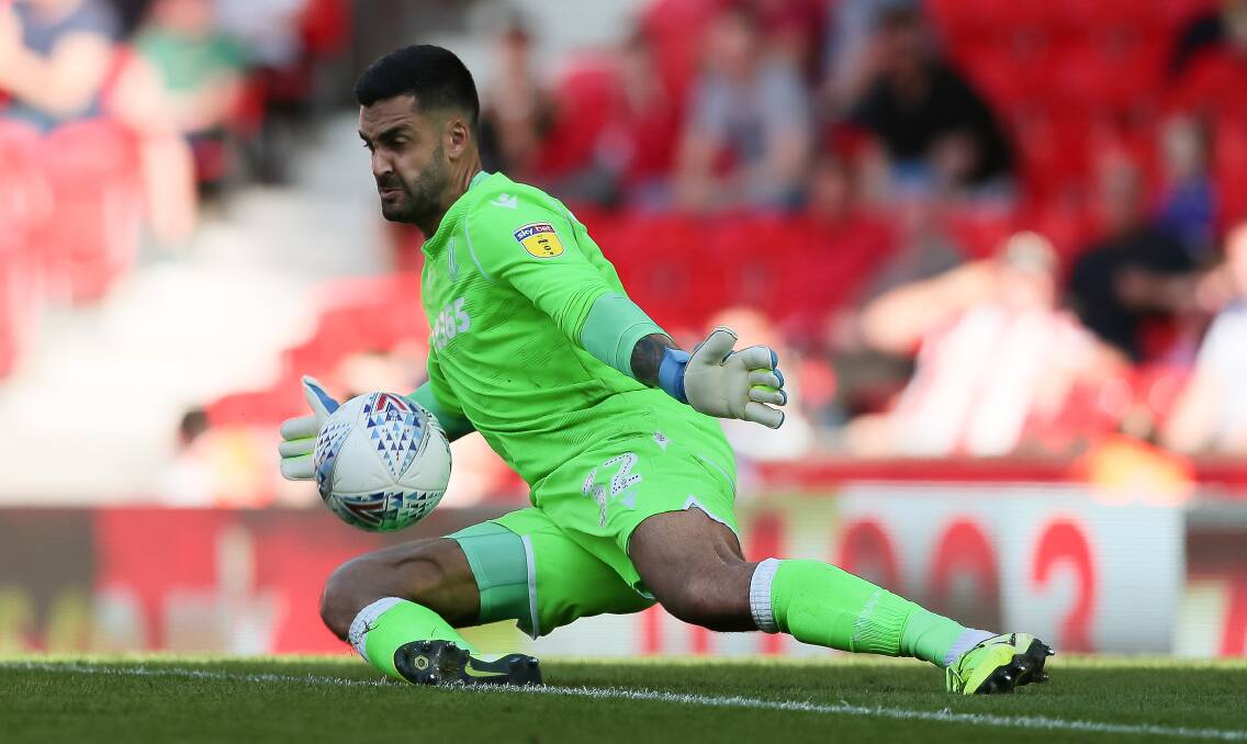 Stoke City's Adam Federici makes a save against Leeds United. Photo: Phil Greig