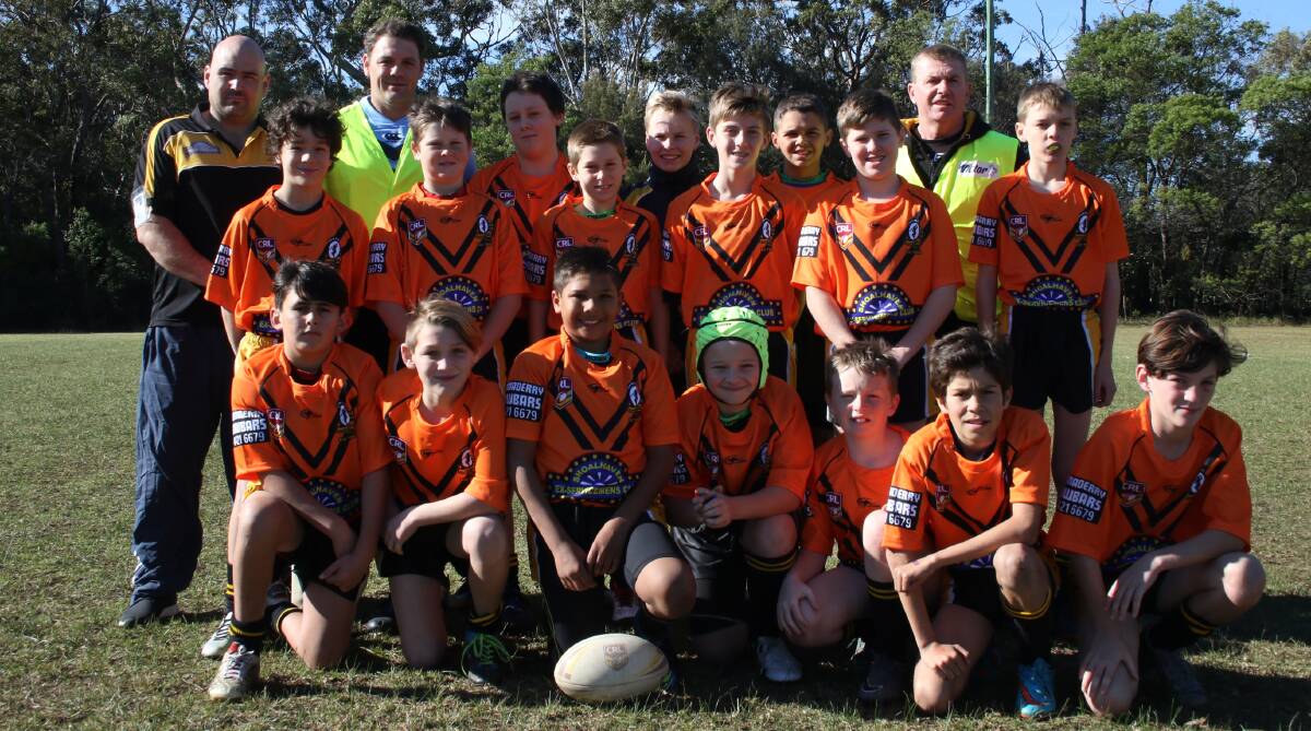 Go team!: The Under 12-2 Warriors play the MOD Group 7 Grand Final this weekend. They are pictured with coach Sean Cruickshank, Chris Regan and Gerald Browne.