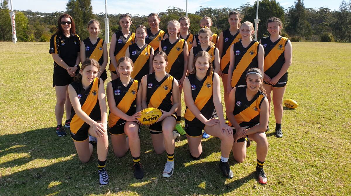 Lyn Robinson and her under 15 girls Bomaderry Tigers team. Photo: Vicki and Ed Barger
