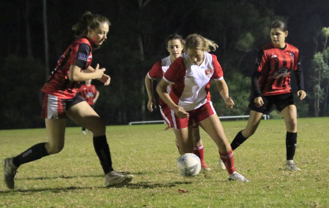 St Georges Basin's Tilhaney Grainger controls the ball against Shoalhaven United on Tuesday. Photo: Tamara Lee