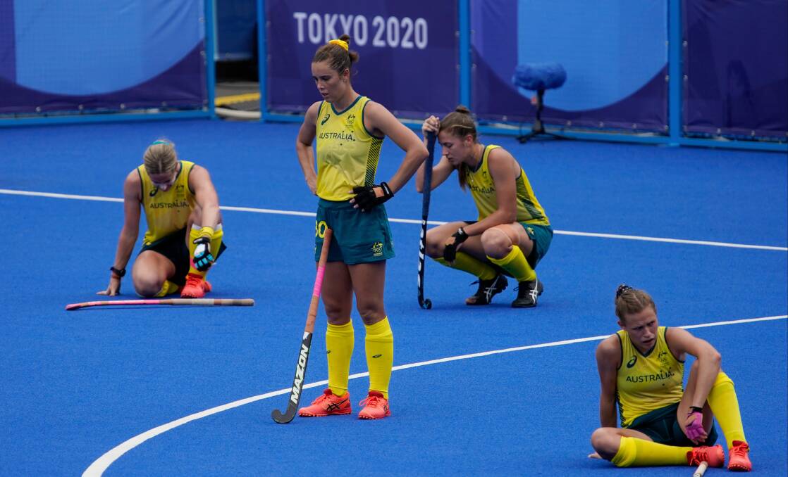 Gerringong's Grace Stewart and her Hockeyroos teammates after Monday's heartbreaking loss to India. Photo: AP
