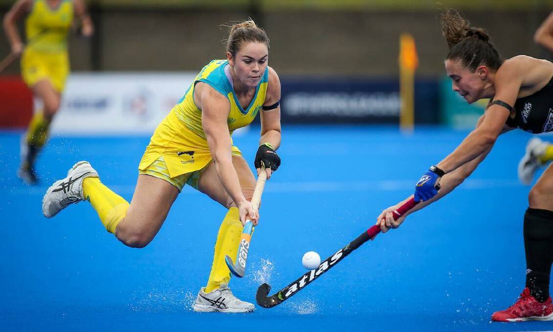 Hockeyroos' Kalindi Commerford attempts to win possession against New Zealand in a match earlier this year. Photo: HA