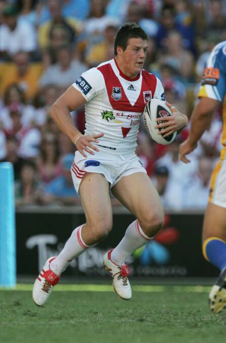 Josh Morris takes a hit-up for the Dragons during his debut against the Titans in 2007. Photo: NRL Imagery