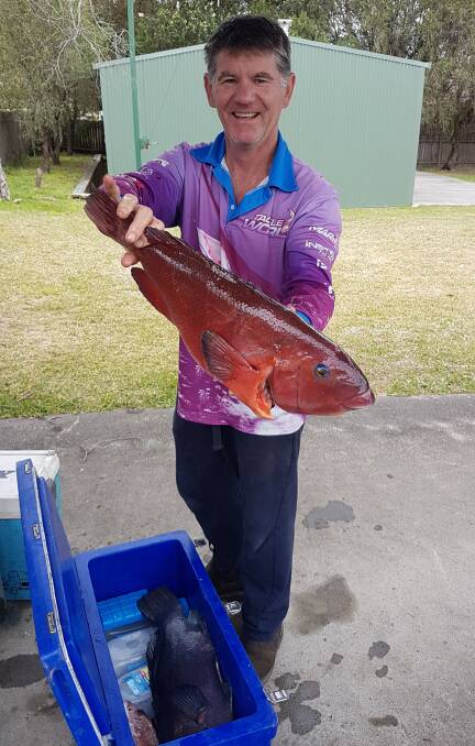 ALL SMILES: Bomaderry angler Doug Payne with the groper he caught.