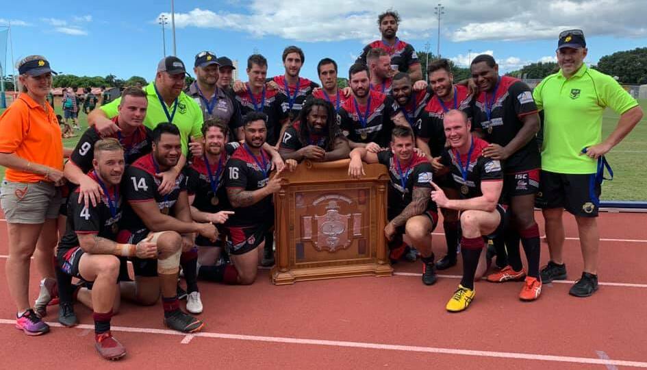 Sam Clune (front row, third from left), Harold Snell (front row, fourth from right) and Jesse Dee (front row, second from right) with their victorious Foley Shield Mackay side.