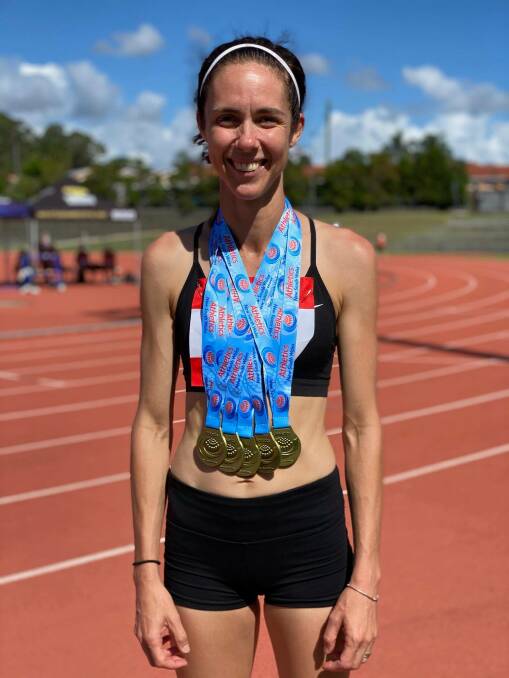 Nowra's Erin Smart with her five gold medals.