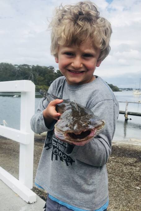 Family fun: Joden Clarke with a nice Crookhaven River flathead. Flatties are on the chew at the moment so why not get out there and catch some with the kids.