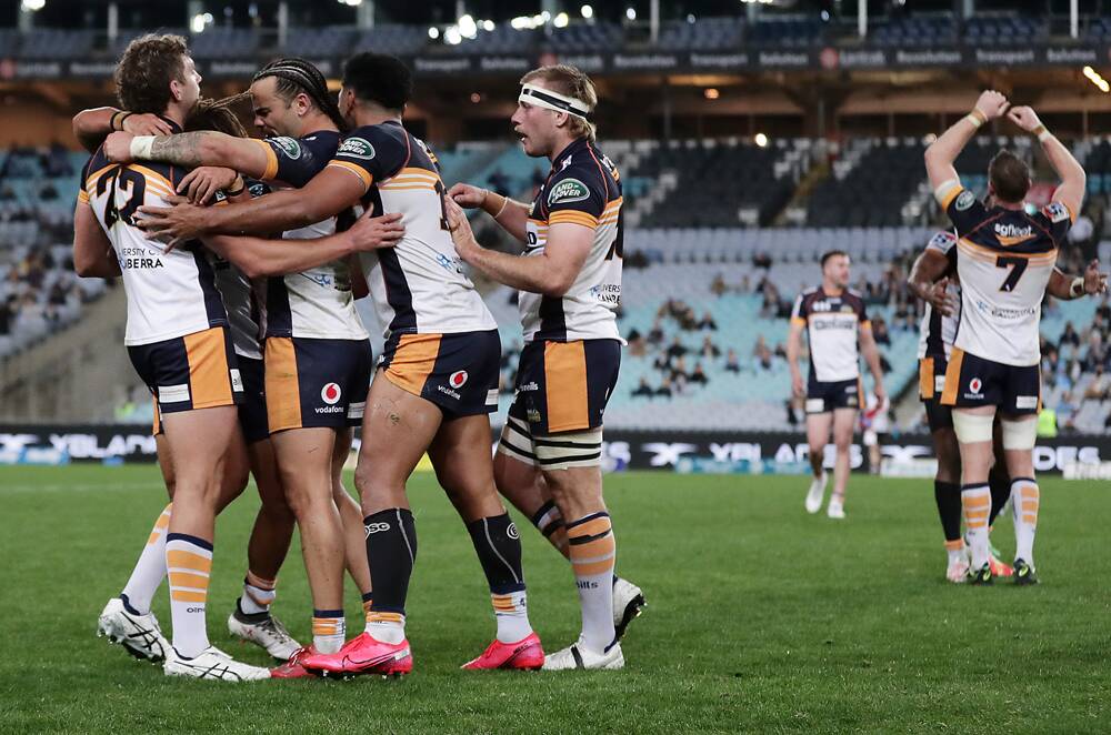 Will Miller (centre) and his Brumbies celebrate their win on Saturday. Photo: Brumbies Rugby