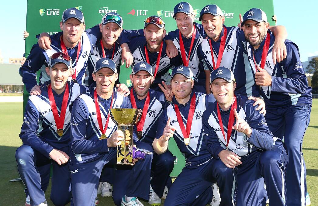 Nic Maddinson (front left) and his Victorian team after their JLT Cup win. Photo: CRICKET AUSTRALIA