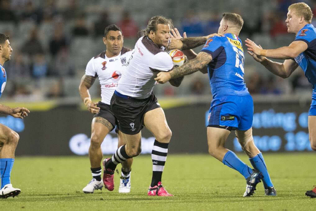 Ashton Sims makes a run against Italy, with James Storer in support. Photo: NRL PHOTOS
