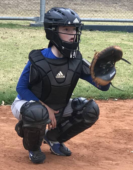 Play ball: Shoalhaven Mariners Junior League catcher Will Canaris ready to take another pitch. The Junior League side heads to Berkeley on Sunday to take on Pirates Gold.