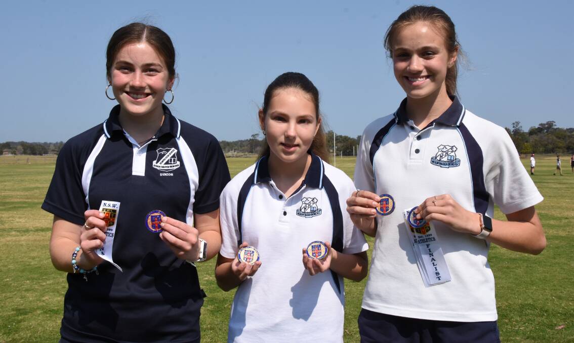 STATE HONOURS: Nowra High School's Mikayla Check, Karlee Symonds and Lara Check, who all won NSW CHS medals. Photo: COURTNEY WARD