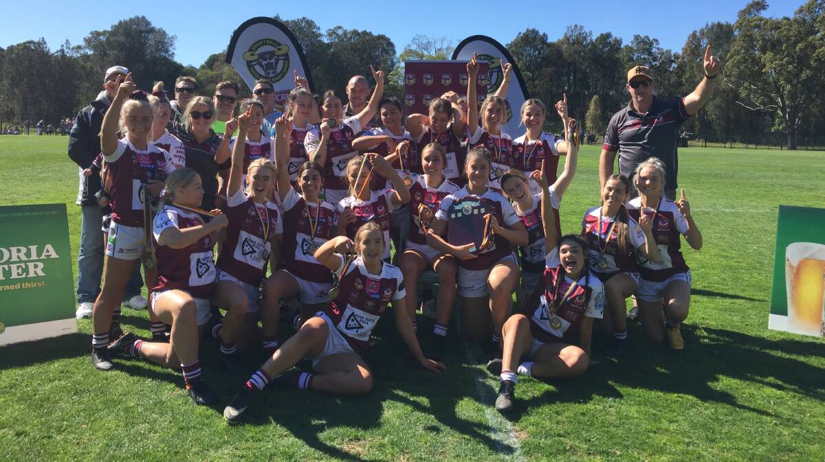 The Albion Park-Oak Flats WLT2 side after their grand final victory. Photo: DAVID HALL