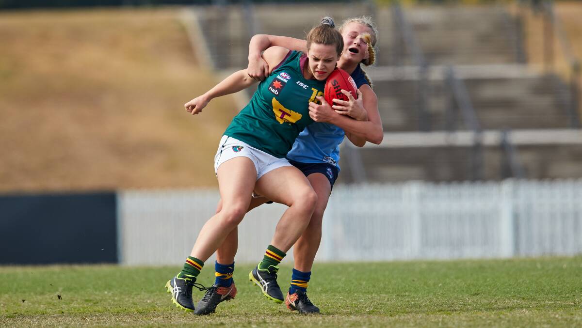 NSW/ACT Rams' Sophie Phillips makes a tackle against Tasmania. Photo: AFL NSW/ACT