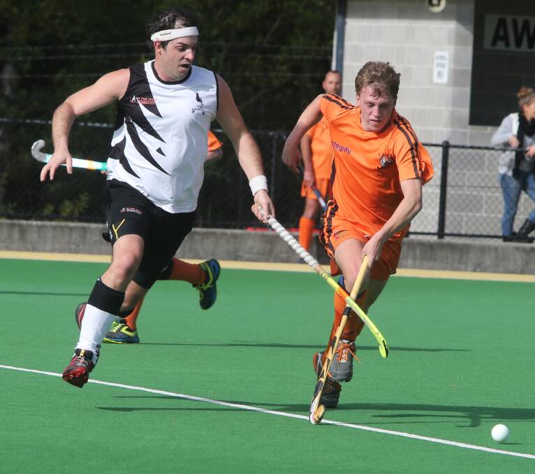 DUEL: Berry Black's Jed Sawkins and Allsorts' Tristan Roberts try to win possession for their team at the Bernie Regan Sporting Complex at the weekend.. Photo: ROBERT CRAWFORD