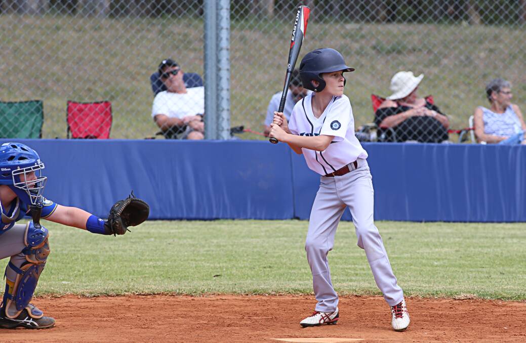 Outgunned: Mariners U14 player Cooper Stibbard in action. The side had trouble handling the Pirates Gold batting line-up last weekend, going down 20-4.