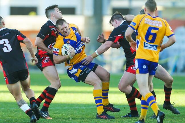 Michael Henderson plays for Dapto against Collegians in the Illawarra Division Rugby League competition. Photo: SUPPLIED