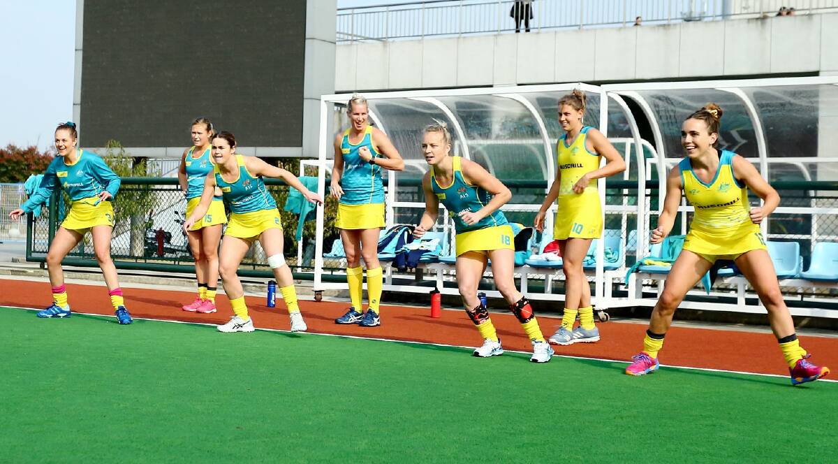 Kalindi Commerford (front row, second from left) and her Hockeyroos team mates in China. Photo: WORLD SPORTS PICS