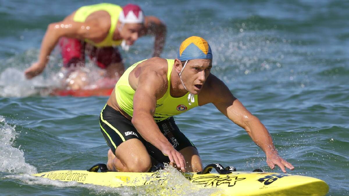 Ali Day competes during the board leg of the Australian ironman race on the Sunshine Coast. Photo: SLSA