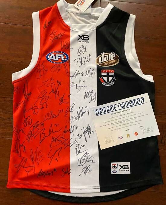 A 2019 St Kilda Saints signed AFL guernsey, which was one of the 12 silent auction items.
