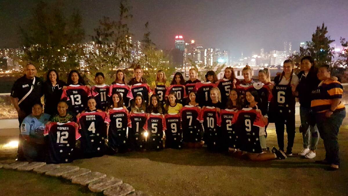 The two Illawarra girl's teams after being presented with their jerseys in Hong Kong.
