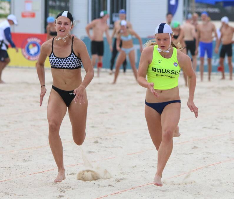 Holly Abbey (right) sprints to the finish line at the recent Australian Titles at the Gold Coast. Photo: KAREN ABBEY