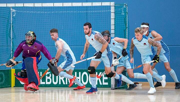 Callum Mackay (third from right), Alex Mackay (far right) and their NSW team during the 2019 national indoor titles. Photo: CLICK INFOCUS