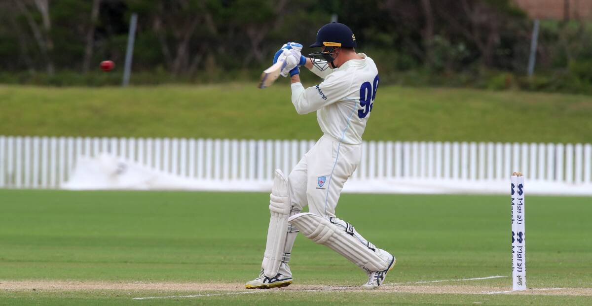 Ulladulla's Matthew Gilkes plays a shot for NSW against Queensland at North Dalton Park. Photo: Sylvia Liber
