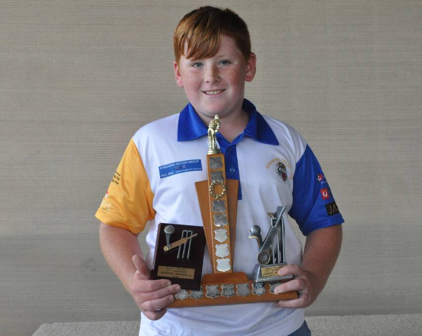 YOUNG GUN: Bomaderry Cricket Club's Jackson Ingram shows off his trophies, which include the under 11s aggregate and all-rounder awards.