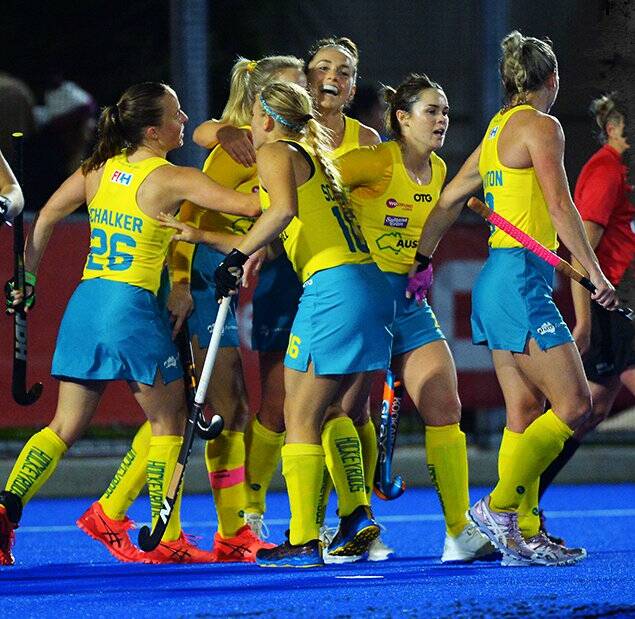 Kalindi Commerford (second from right) and her Hockeyroos teammates celebrate a goal on Tuesday. Photo: Hockey Australia
