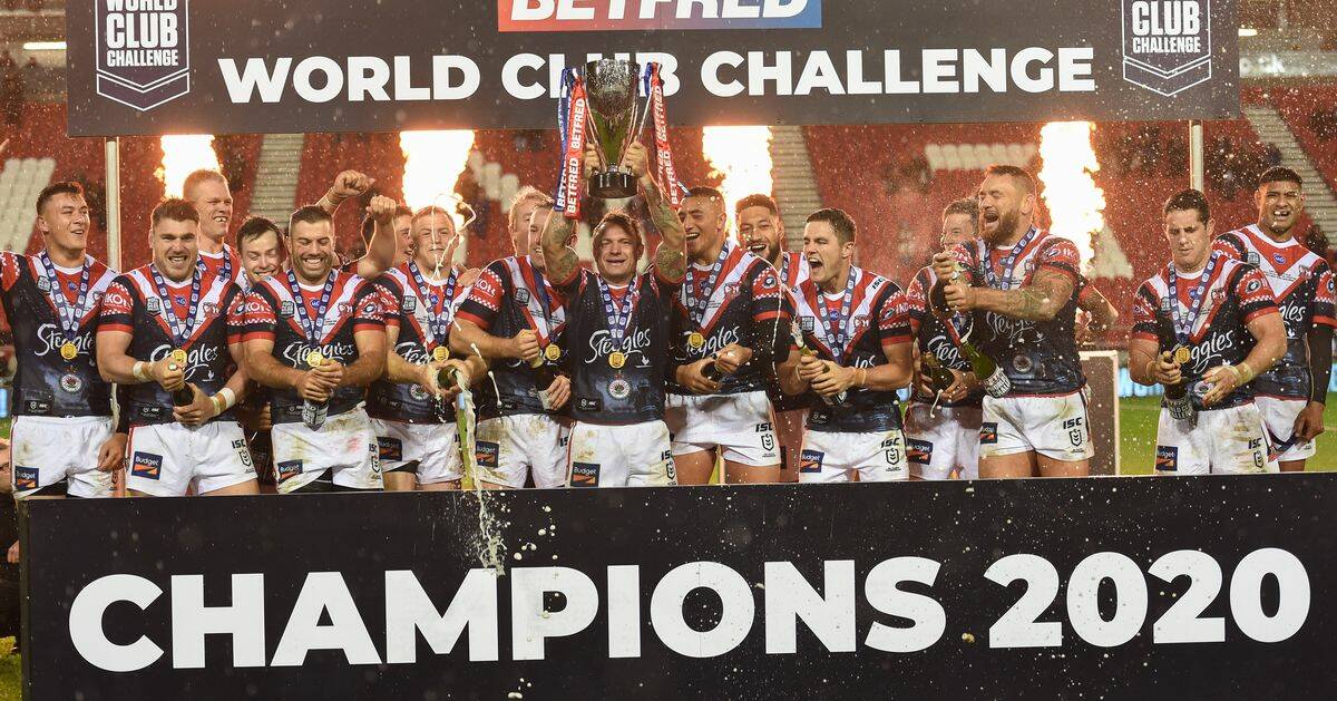 Kiama's Brett Morris (seventh from the left) and his Sydney teammates celebrate the World Club Challenge win. Photo: ROOSTERS MEDIA