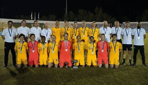 Ben Atkins (back row, eighth from left) and his Pararoos team with their silver medals. Photo: FFA