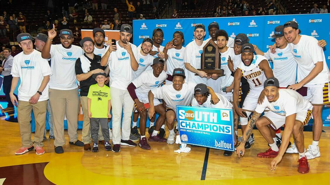Kyle Zunic (seventh from left) and his victorious Winthrop Eagles team. Photo: EAGLES MEDIA
