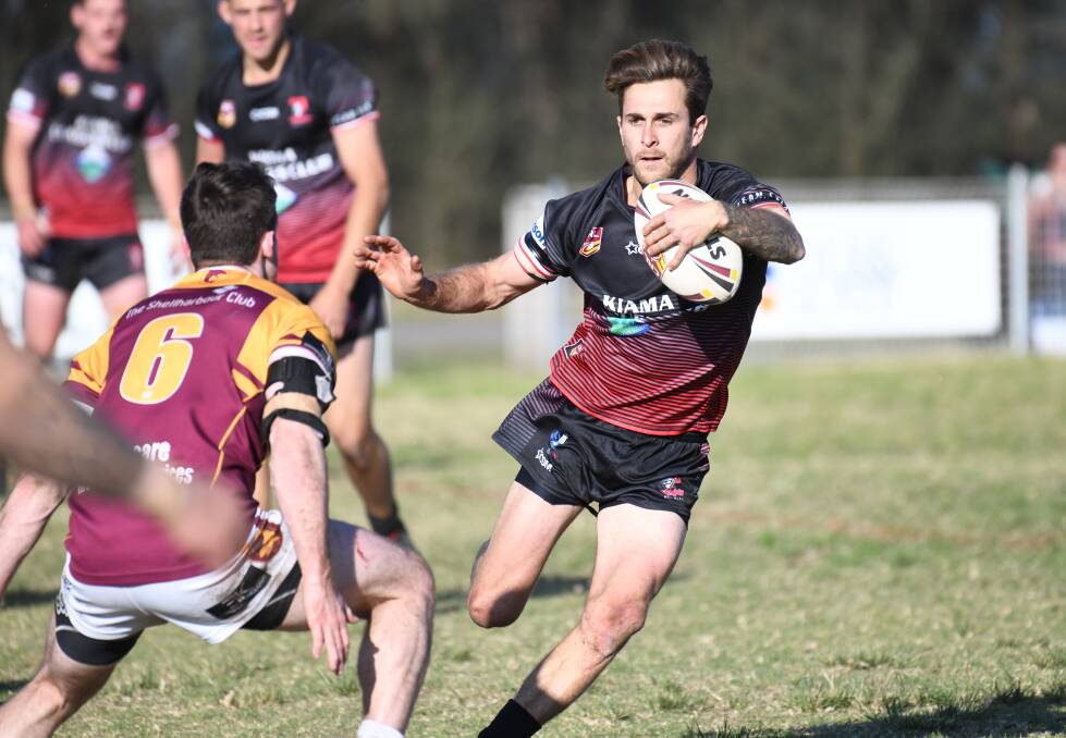 Kiama's Tom Atkins makes a run against Shellharbour during Sunday's preliminary final at Cec Glenholmes Oval. Photo: KRISTIE LAIRD