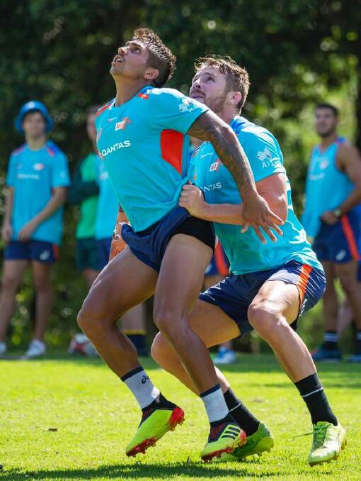 Berry's Tom Connor sets himself to lift teammate Maurice Longbottom during training. Photo: AU7s